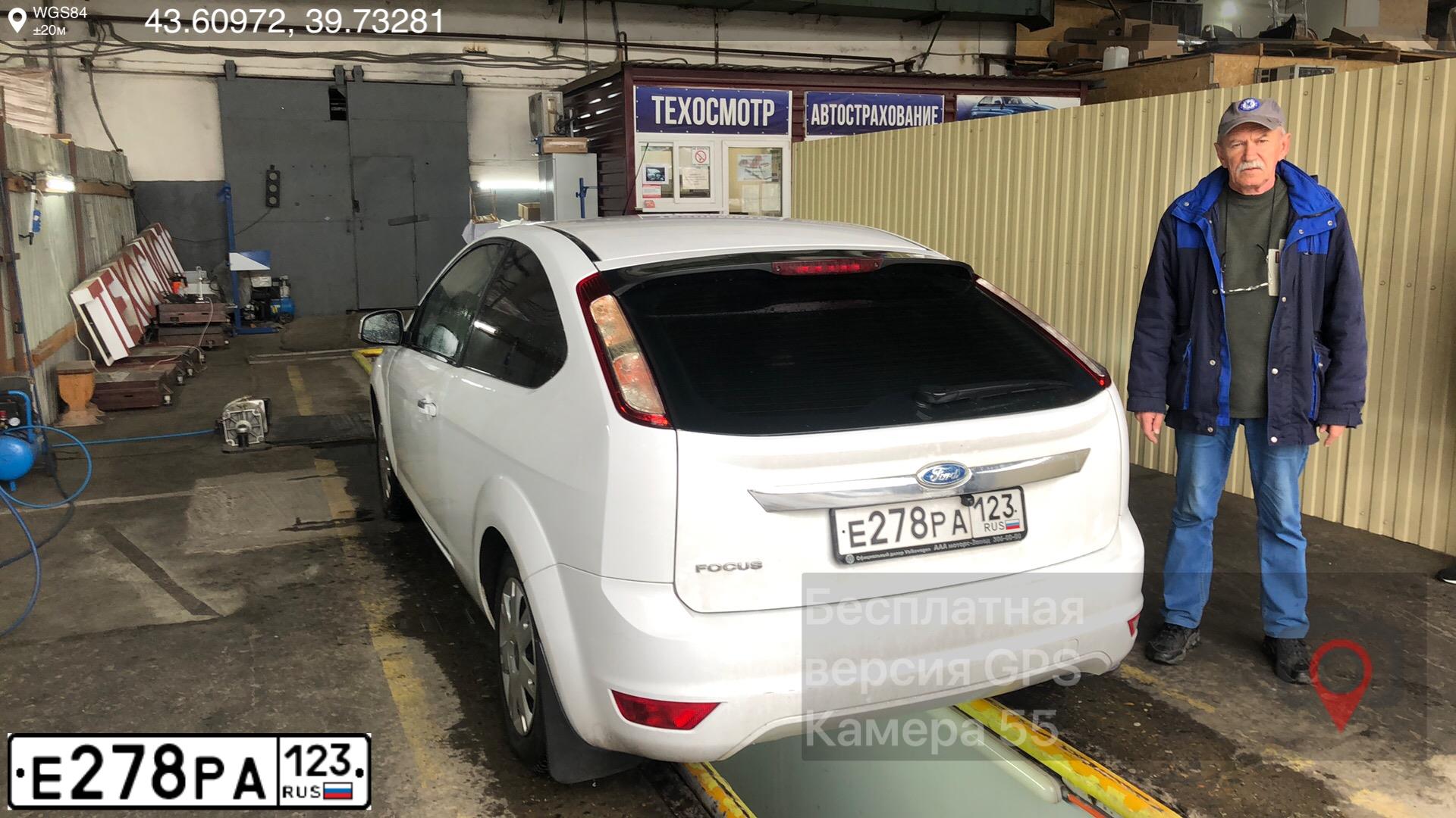 Фото автомобиля FORD FOCUS, 2009 — госномер В411ОХ155. Цвет: БЕЛЫЙ