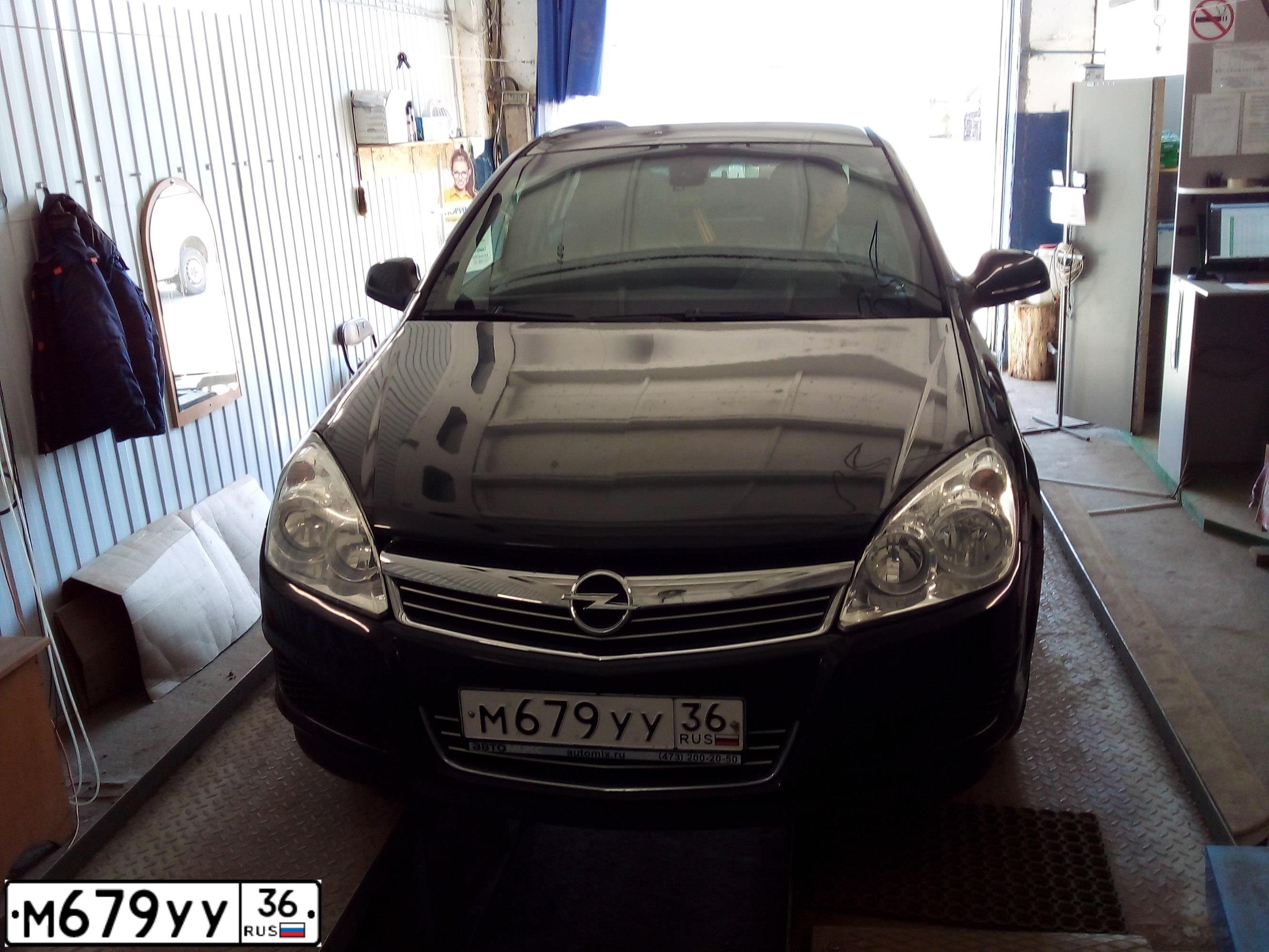 Фото автомобиля OPEL ASTRA, 2012 — госномер М679УУ36. Цвет: ЧЕРНЫЙ