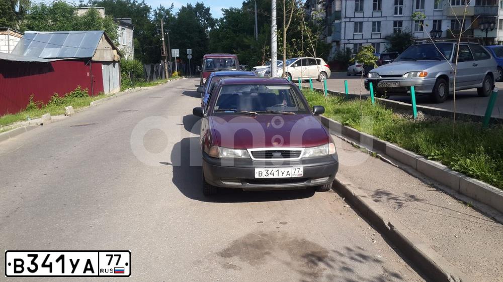 Фото автомобиля DAEWOO NEXIA, 2005 — госномер С400АВ193. Цвет: ТЕМНО-КРАСНЫЙ