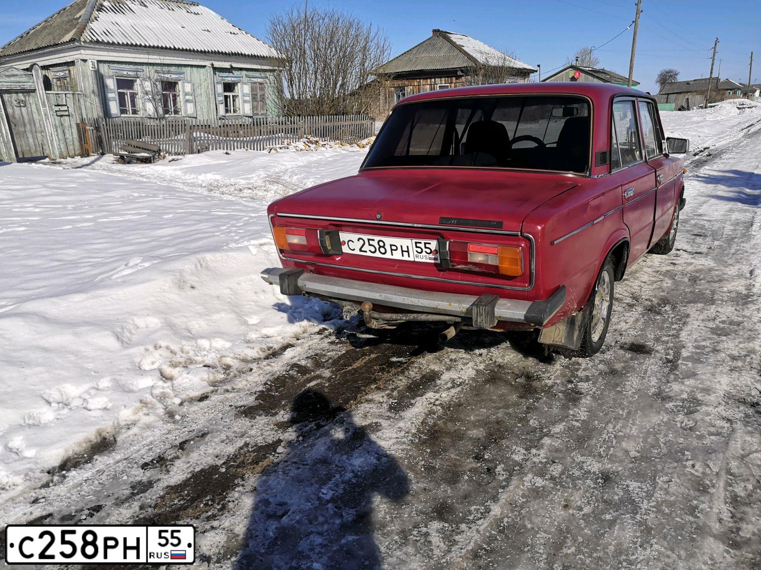 Фото автомобиля LADA 2106, 1997 — госномер Х215ХР55. Цвет: Красный