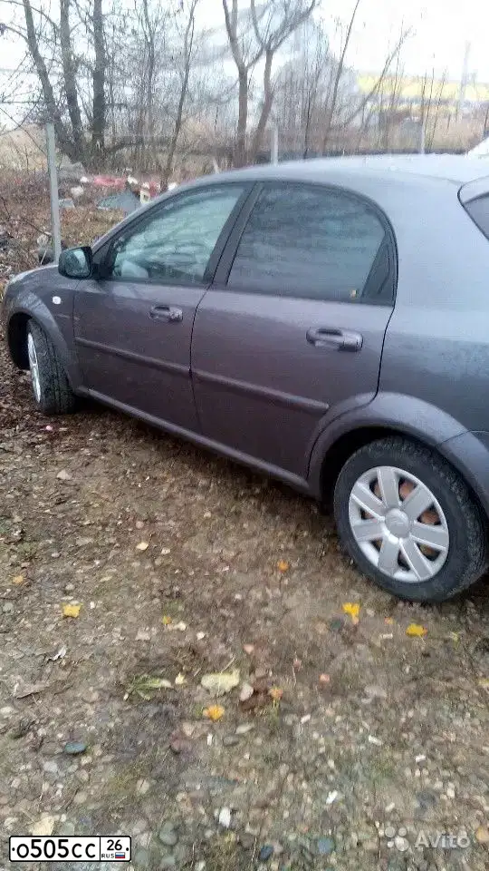 Фото автомобиля CHEVROLET LACETTI, 2012 — госномер О505СС26. Цвет: Серый