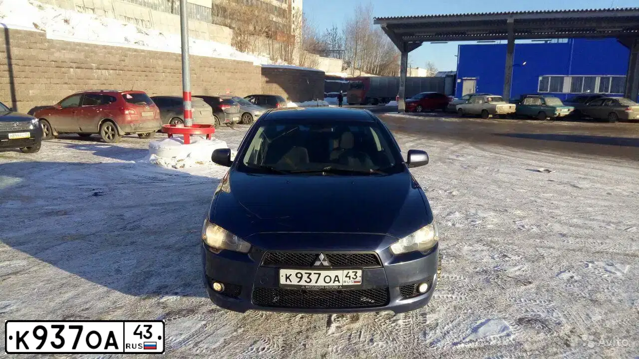 Фото автомобиля FORD FOCUS, 2012 — госномер Н410СА152. Цвет: ЧЕРНЫЙ