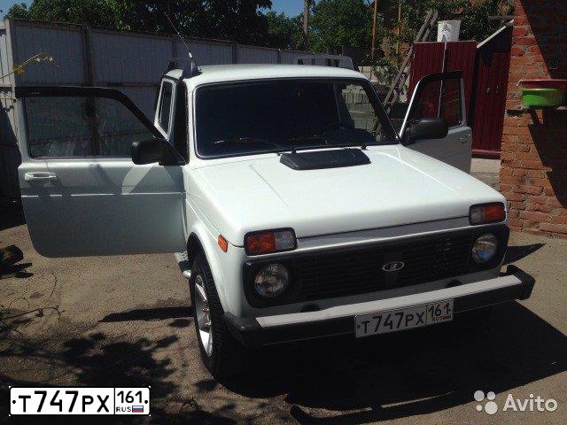 Фото автомобиля LADA 2121 NIVA, 2013 — госномер Т747РХ161. Цвет: БЕЛЫЙ ЯРКИЙ