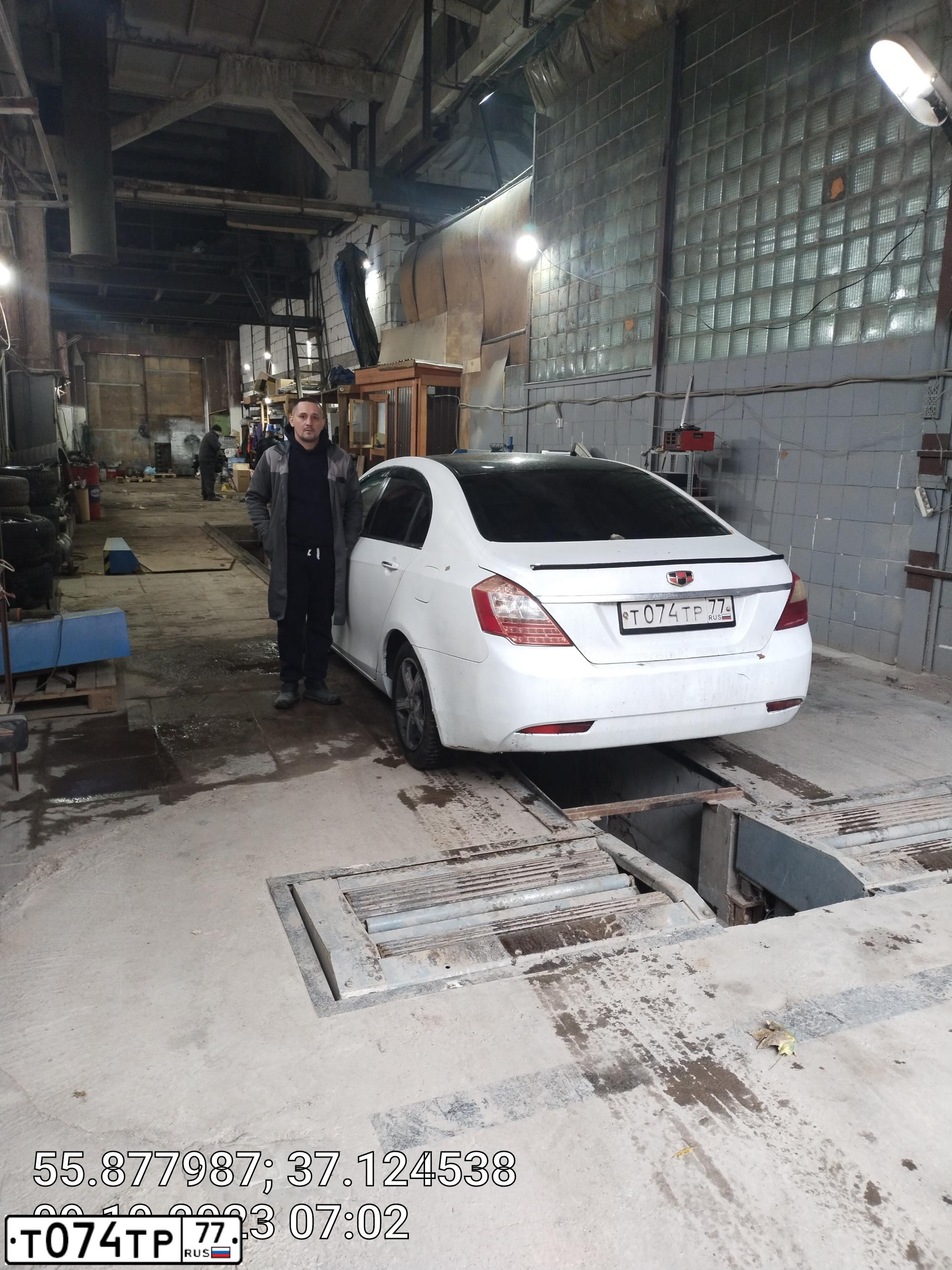 Фото автомобиля GEELY EMGRAND, 2013 — госномер Н013УС790. Цвет: Белый