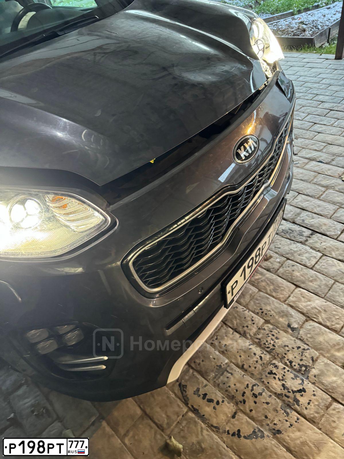 Фото автомобиля KIA SPORTAGE, 2017 — госномер Р198РТ777. Цвет: Серый