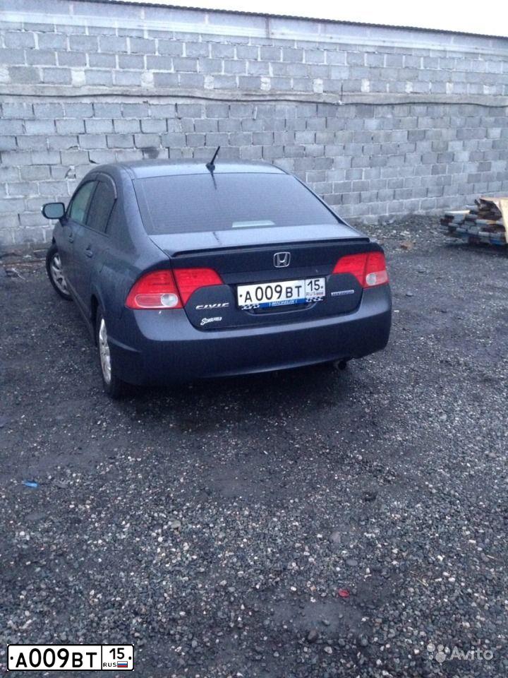 Фото автомобиля HONDA CIVIC, 2007 — госномер Х950ЕЕ65. Цвет: СЕРЫЙ
