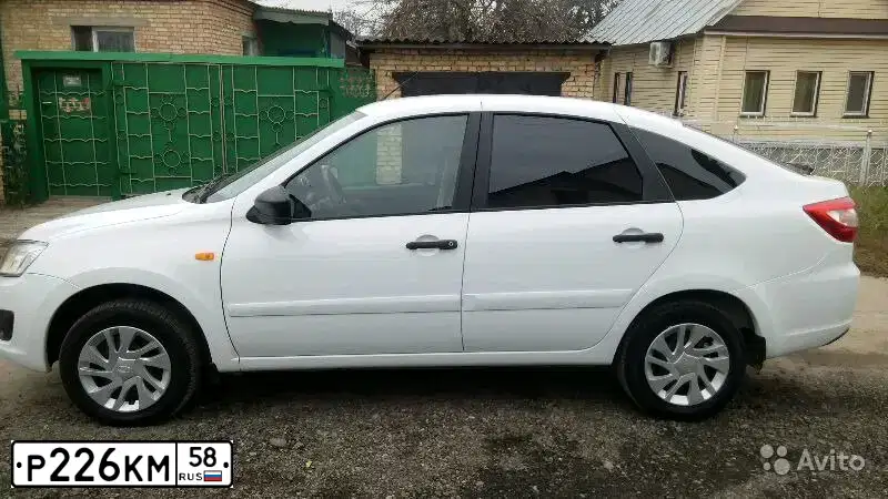 Фото автомобиля LADA 2191 GRANTA, 2015 — госномер М507КА164. Цвет: БЕЛЫЙ