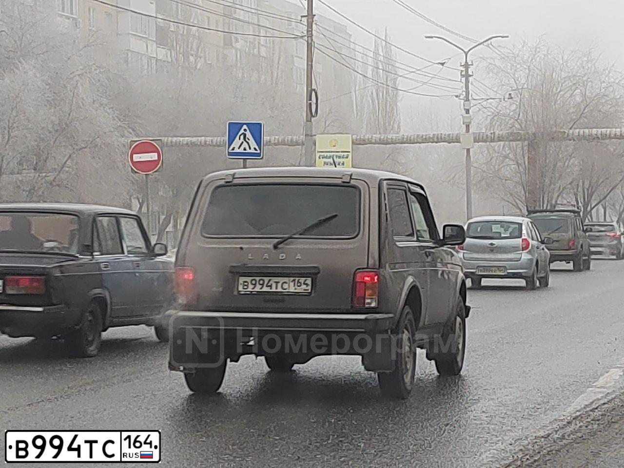 Фото автомобиля TOYOTA RAV4, 2011 — госномер К848НС29. Цвет: Красный