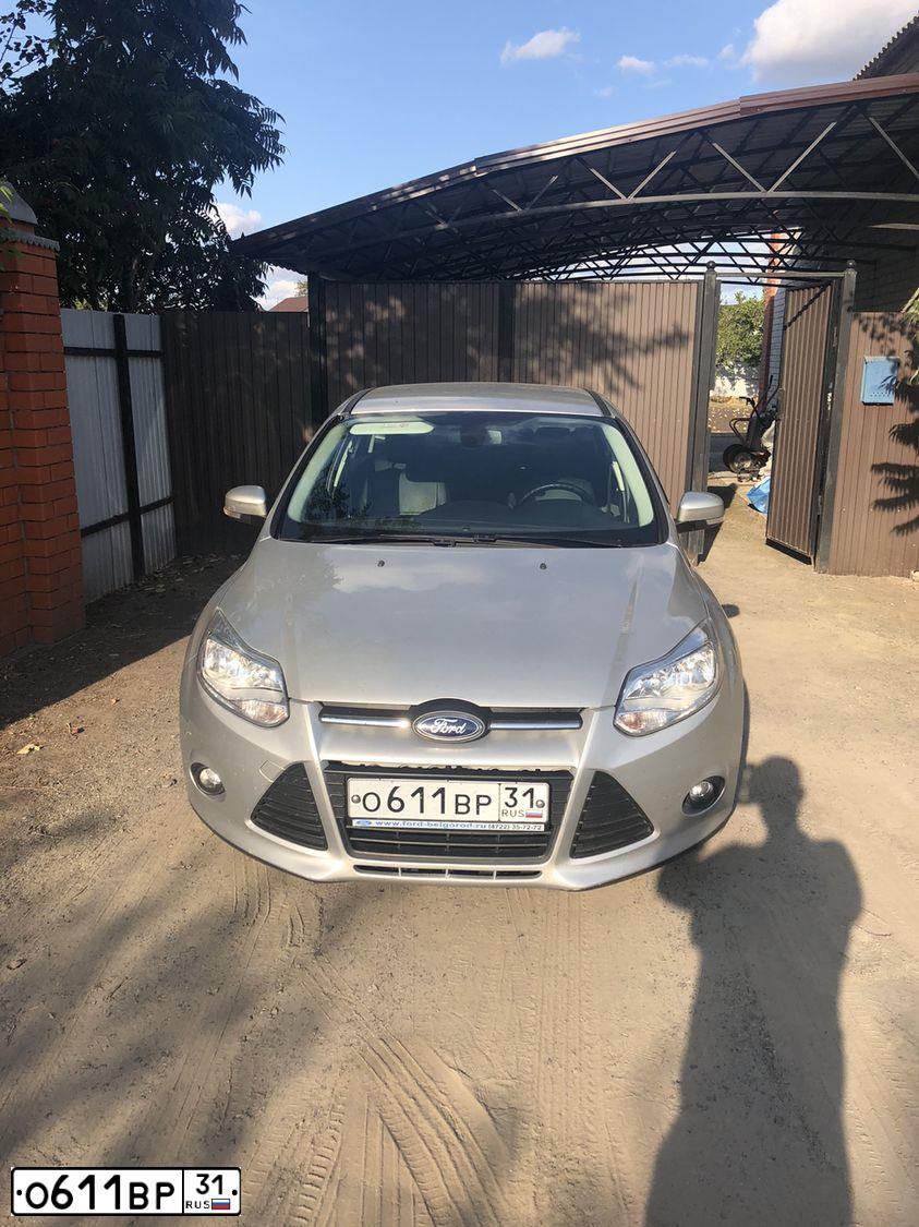 Фото автомобиля FORD FOCUS, 2015 — госномер К762ЕЕ136. Цвет: Серебристый