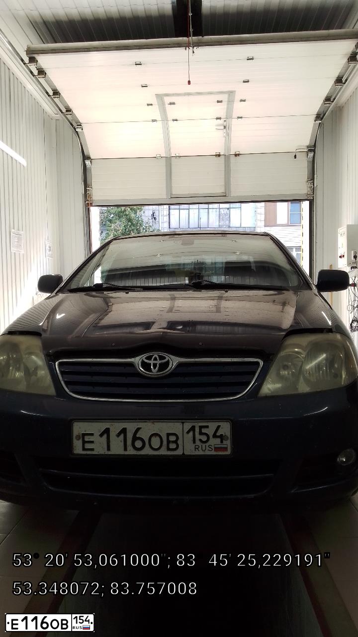 Фото автомобиля TOYOTA COROLLA, 2004 — госномер Х496ЕУ154. Цвет: ТЕМНО СИНИЙ