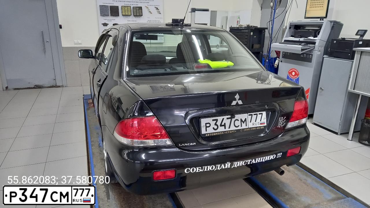 Фото автомобиля MITSUBISHI LANCER, 2006 — госномер Р347СМ777. Цвет: ЧЕРНЫЙ