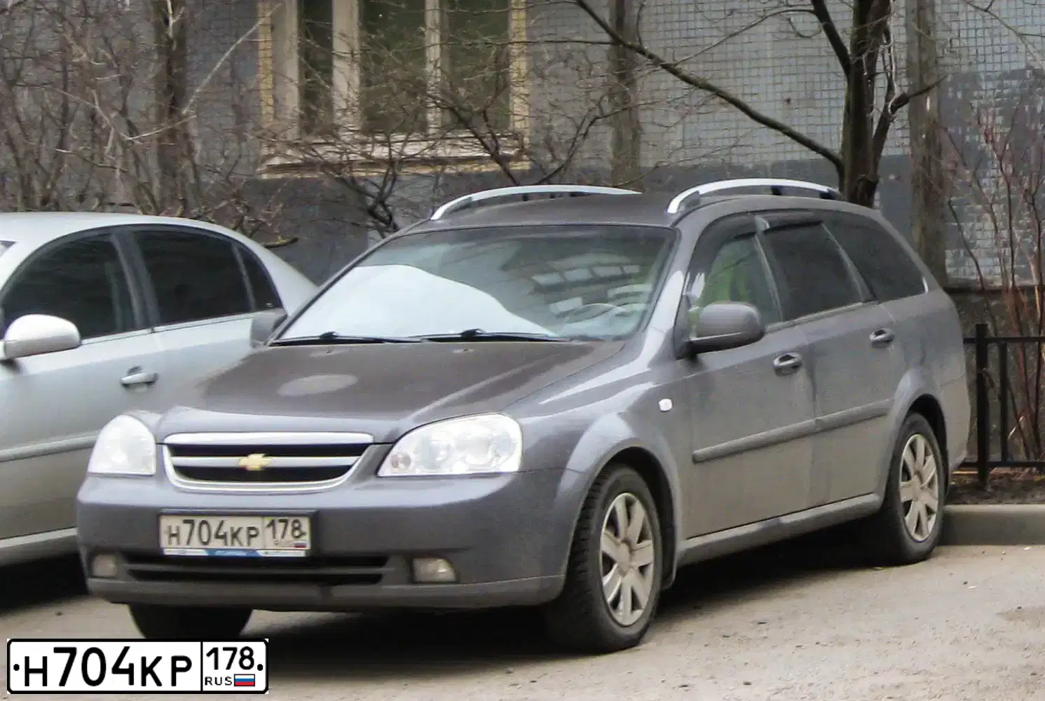 Фото автомобиля CHEVROLET LACETTI, 2012 — госномер В306МХ92. Цвет: Серый