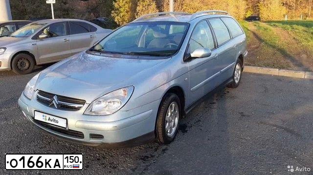 Фото автомобиля CITROEN C5, 2003 — госномер О166КА150. Цвет: СВЕТЛО-ГОЛУБОЙ