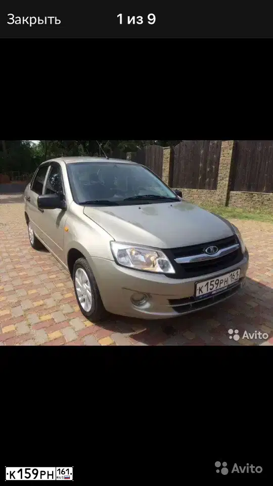 Фото автомобиля LADA 2190 GRANTA, 2013 — госномер К159РН161. Цвет: СЕРО-БЕЖЕВЫЙ