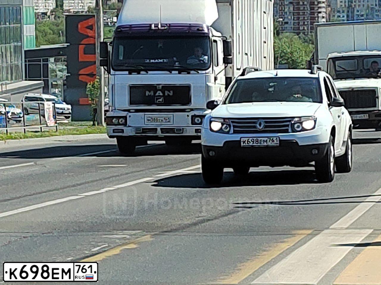 Фото автомобиля RENAULT DUSTER, 2014 — госномер К698ЕМ761. Цвет: Белый
