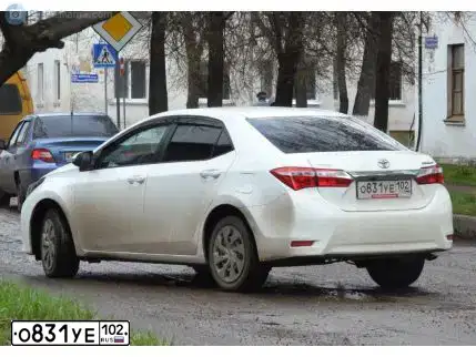 Фото автомобиля TOYOTA COROLLA, 2013 — госномер О831УЕ102. Цвет: БЕЛЫЙ
