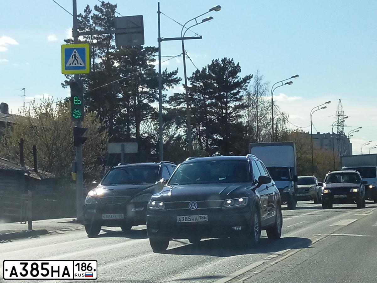 Фото автомобиля VOLKSWAGEN TIGUAN, 2017 — госномер А385НА186. Цвет: ТЕМНО-СИНИЙ