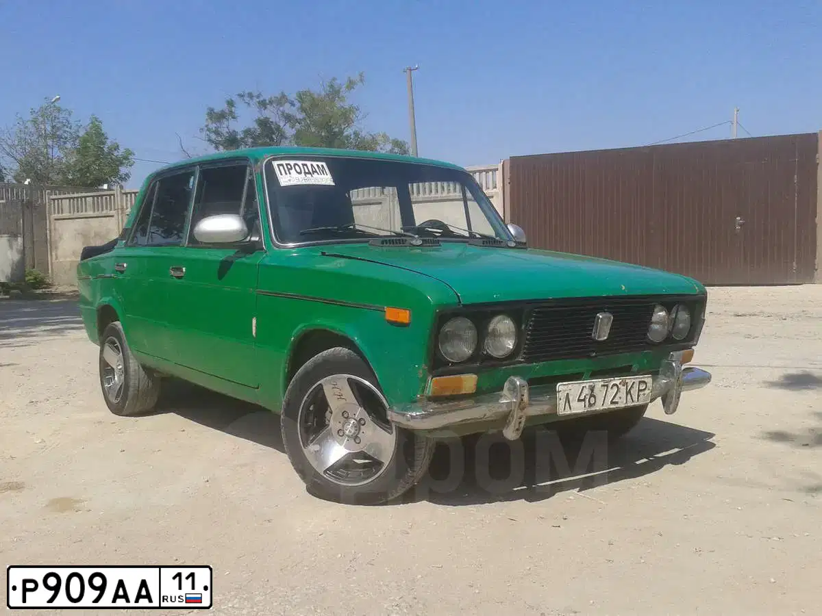 Фото автомобиля MITSUBISHI L 200, 2008 — госномер О111КВ11. Цвет: ТЕМНО СЕРЫЙ