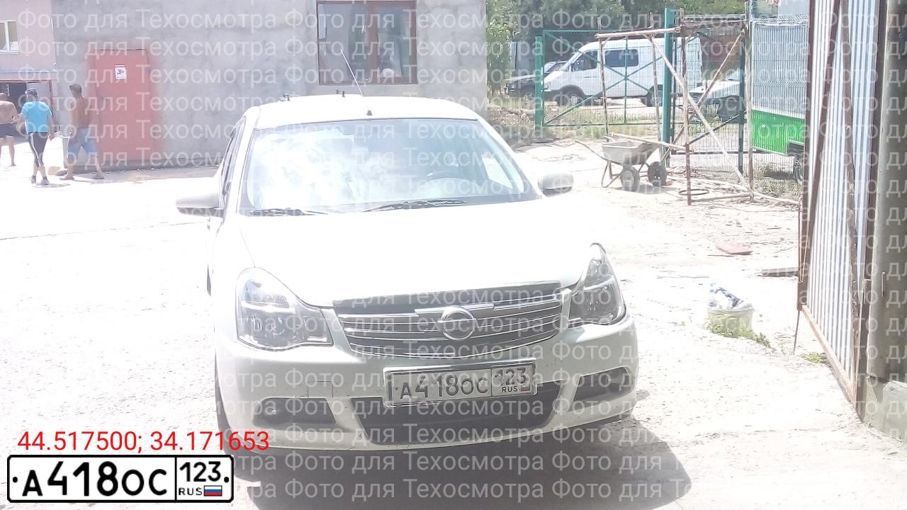 Фото автомобиля NISSAN ALMERA /AVTOVAZ/, 2014 — госномер М523КС82. Цвет: Белый
