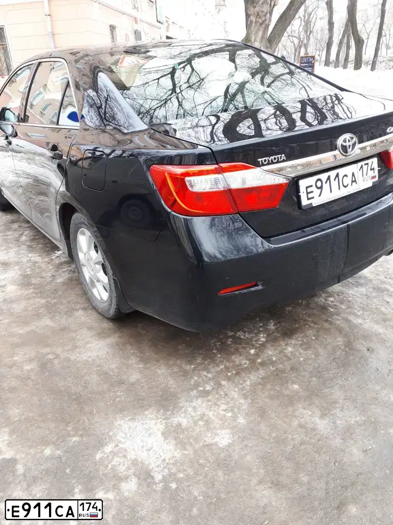Фото автомобиля TOYOTA CAMRY, 2012 — госномер Е911СА174. Цвет: ЧЕРНЫЙ