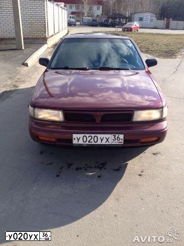 Фото автомобиля NISSAN MAXIMA, 1989 — госномер У020УХ36. Цвет: ВИШНЕВЫЙ