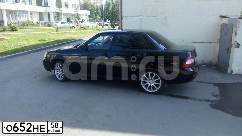 Фото автомобиля ЛАДА 217030 LADA PRIORA, 2011 — госномер К919ОМ95. Цвет: Сине-Черный