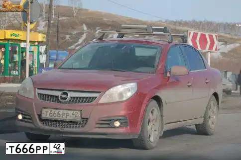 Фото автомобиля OPEL VECTRA, 2006 — госномер Т666РР42. Цвет: БОРДОВЫЙ