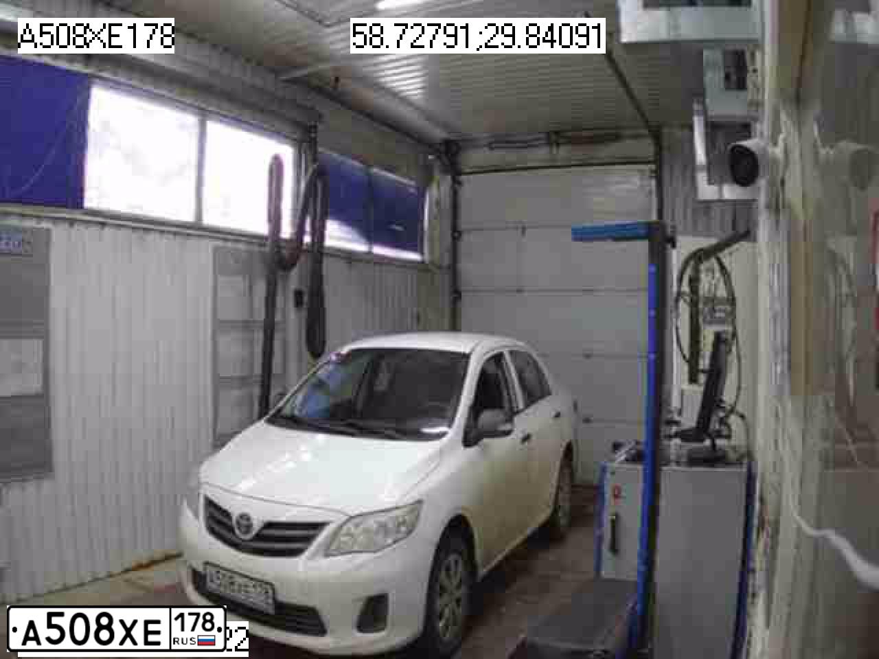 Фото автомобиля TOYOTA COROLLA, 2010 — госномер Т969АУ39. Цвет: Белый