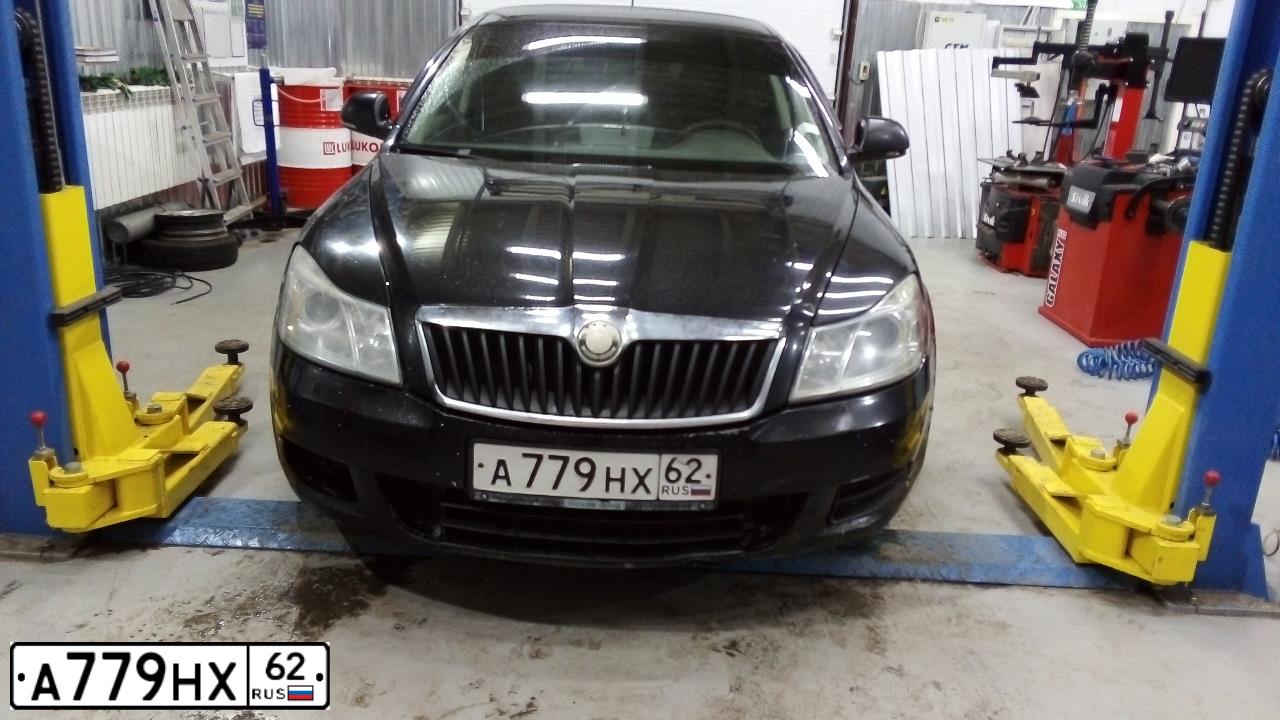 Фото автомобиля SKODA OCTAVIA, 2008 — госномер А779НХ62. Цвет: ЧЕРНЫЙ
