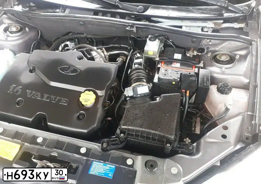 Фото автомобиля LADA 2190 GRANTA, 2012 — госномер Н693КУ30. Цвет: Темно-серый металлик