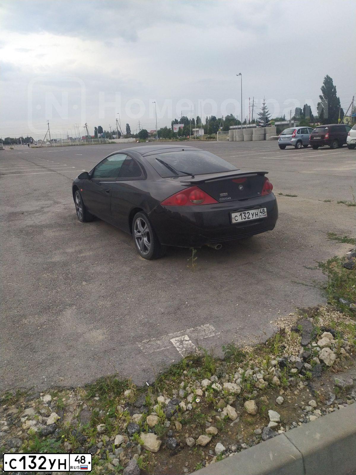 Фото автомобиля MERCURY COUGAR, 2001 — госномер С132УН48. Цвет: ЧЕРНЫЙ