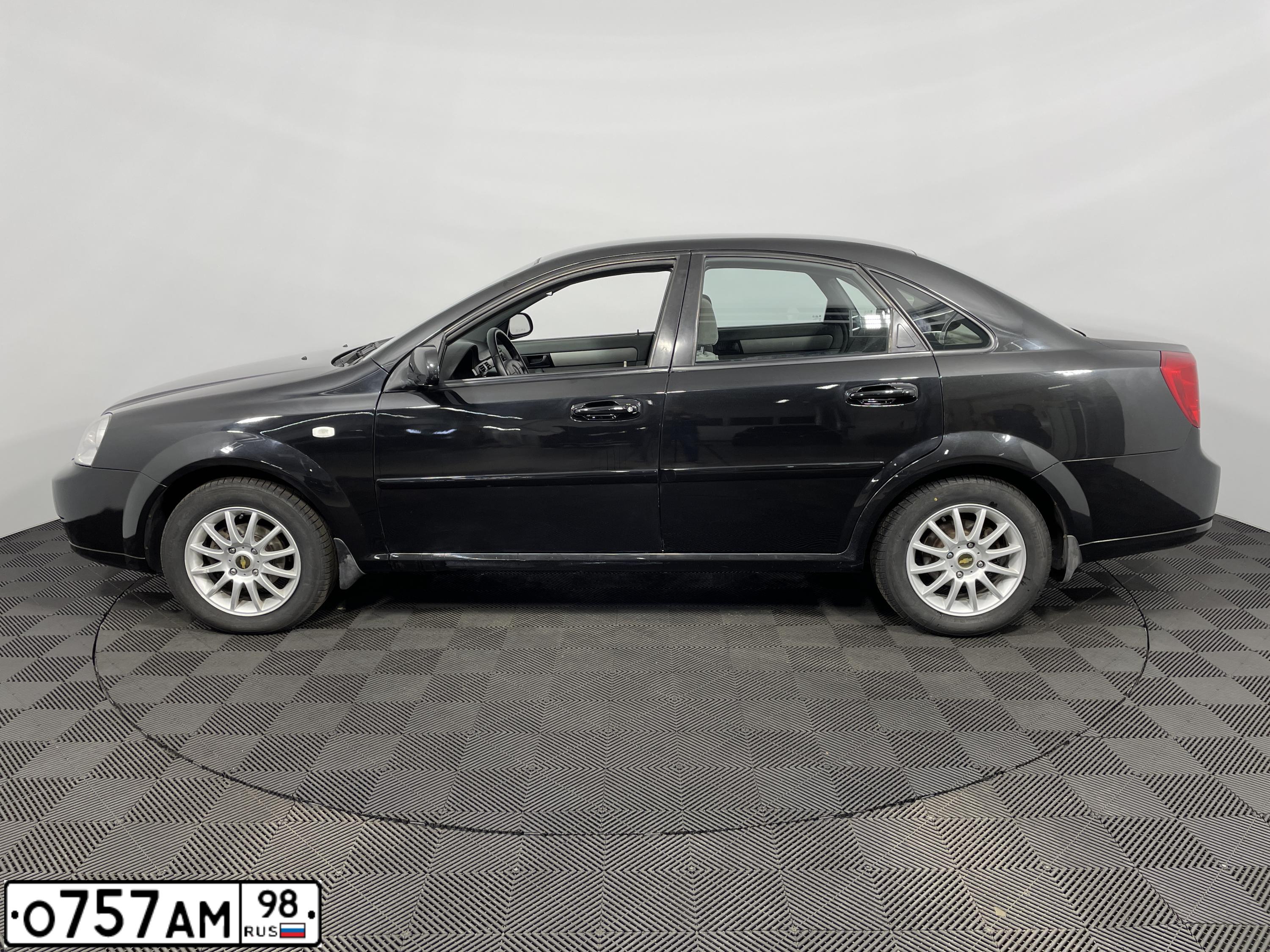 Фото автомобиля CHEVROLET LACETTI, 2009 — госномер М688ЕО35. Цвет: ЧЕРНЫЙ