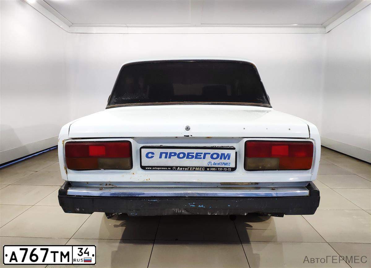 Фото автомобиля LADA 2107, 2001 — госномер М667РУ36. Цвет: ЯРКО БЕЛЫЙ