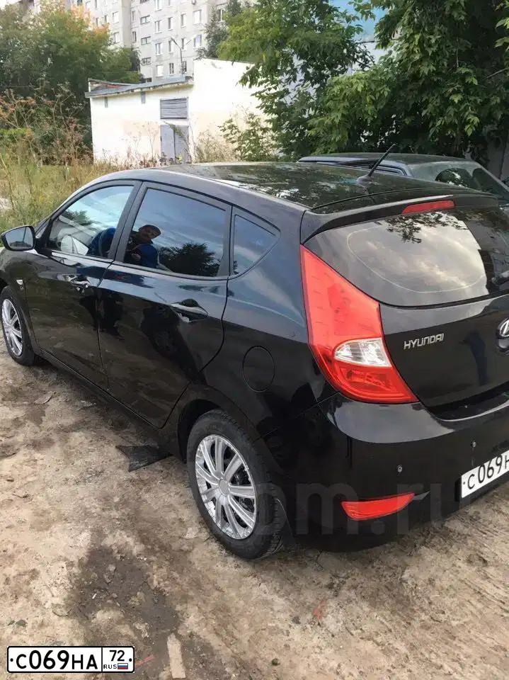 Фото автомобиля HYUNDAI SOLARIS, 2012 — госномер С069НА72. Цвет: ЧЕРНЫЙ