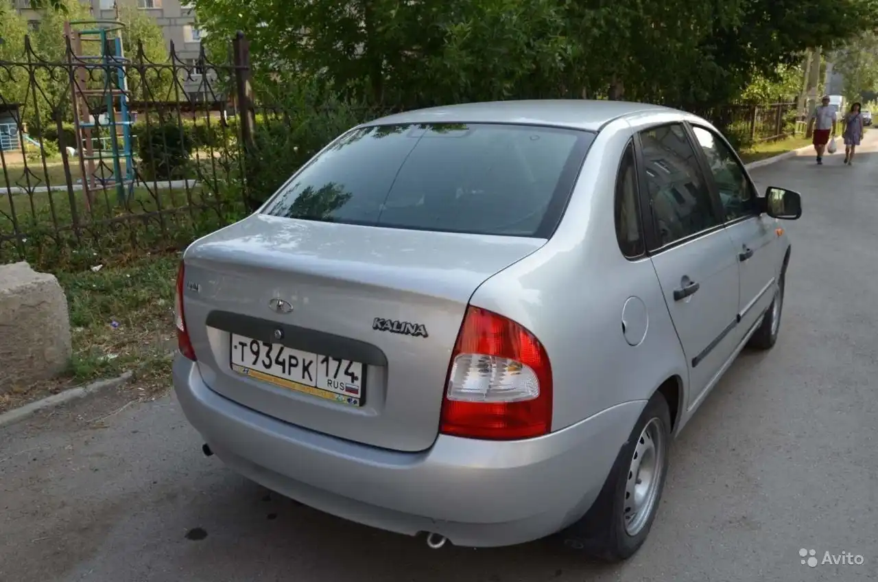 Фото автомобиля LADA KALINA, 2009 — госномер О070АО774. Цвет: Серебристый