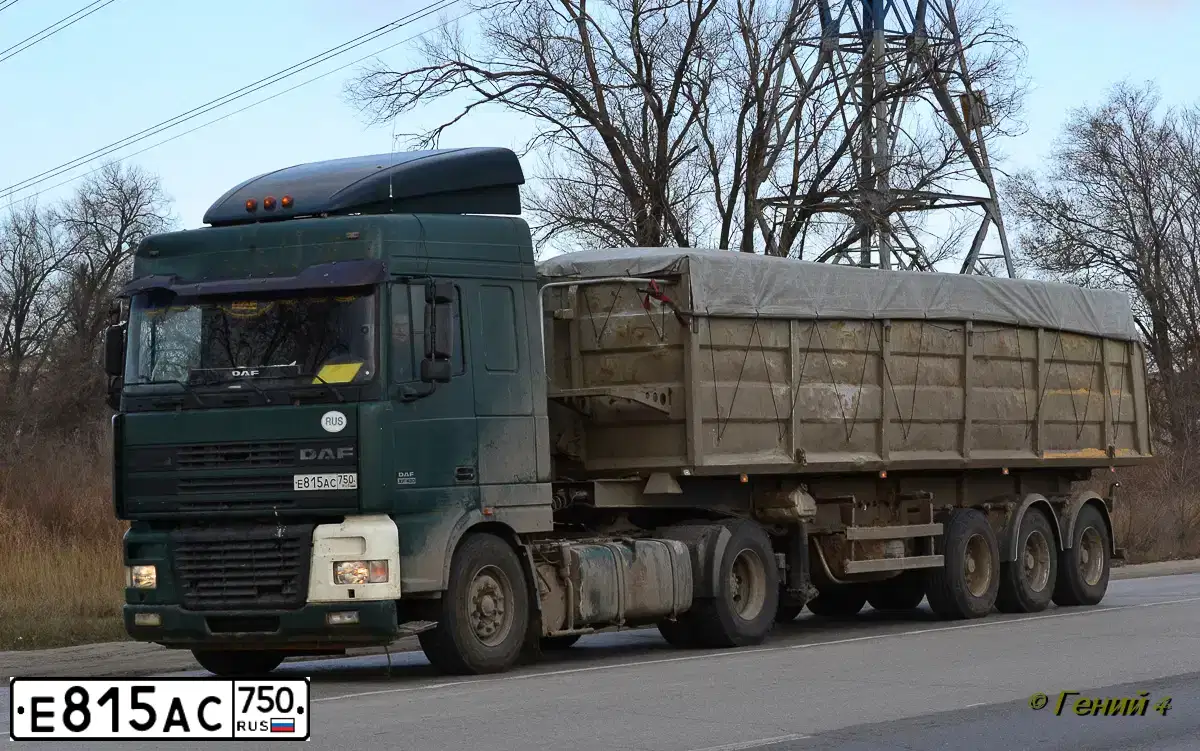 Фото автомобиля DAF XF 95 FT /4X2/, 2000 — госномер Е815АС750. Цвет: ЗЕЛЕНЫЙ ТЕМНЫЙ