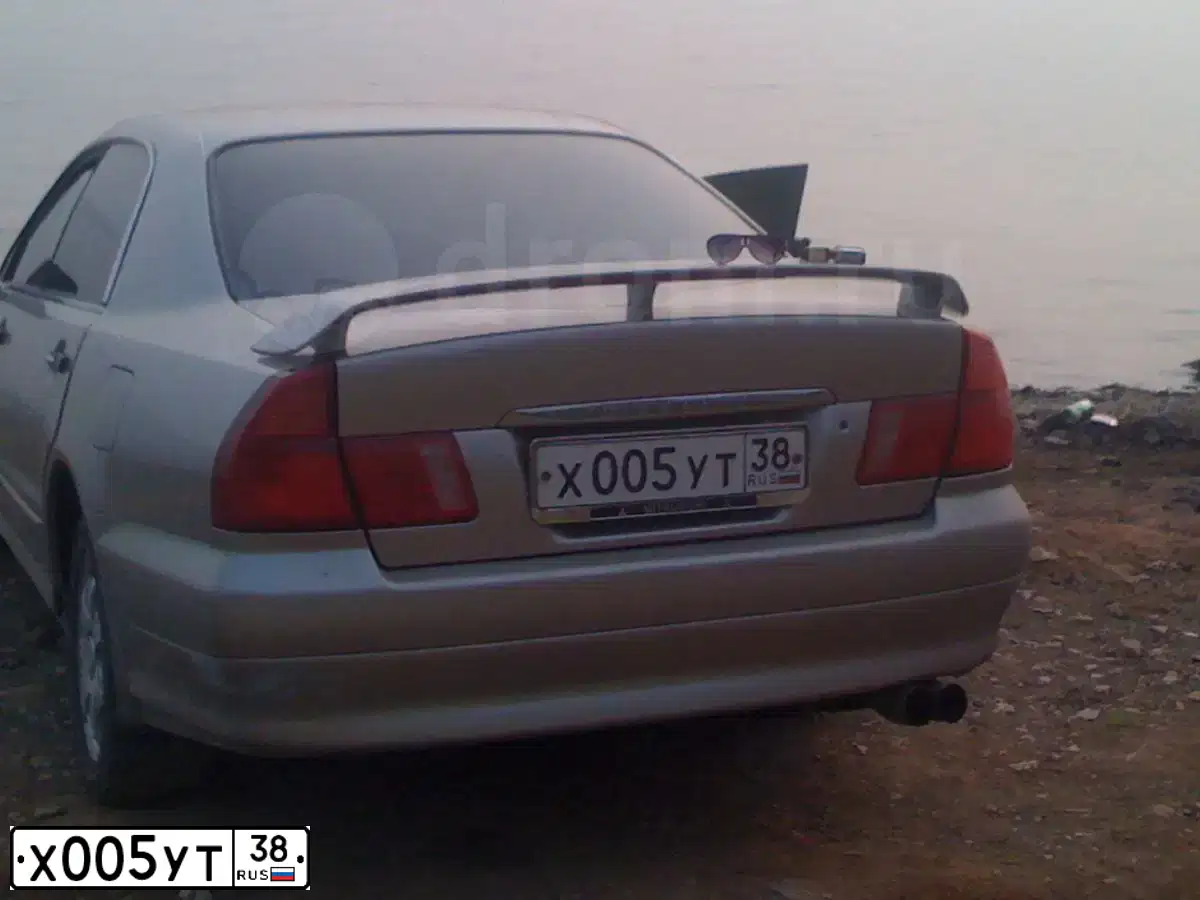 Фото автомобиля LADA 2109 SAMARA, 1996 — госномер Х005УТ38. Цвет: Темно-синий