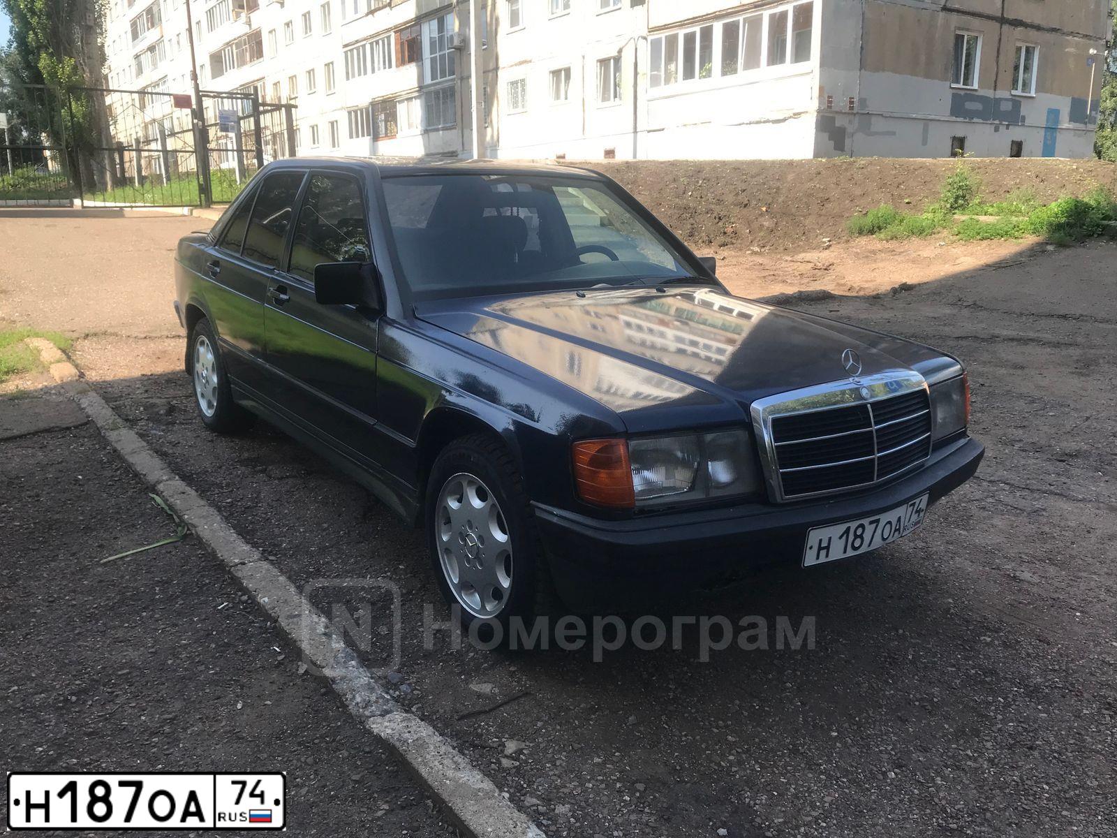 Фото автомобиля MERCEDES C-KLASSE, 1986 — госномер Н187ОА74. Цвет: ТЕМНО-СИНИЙ