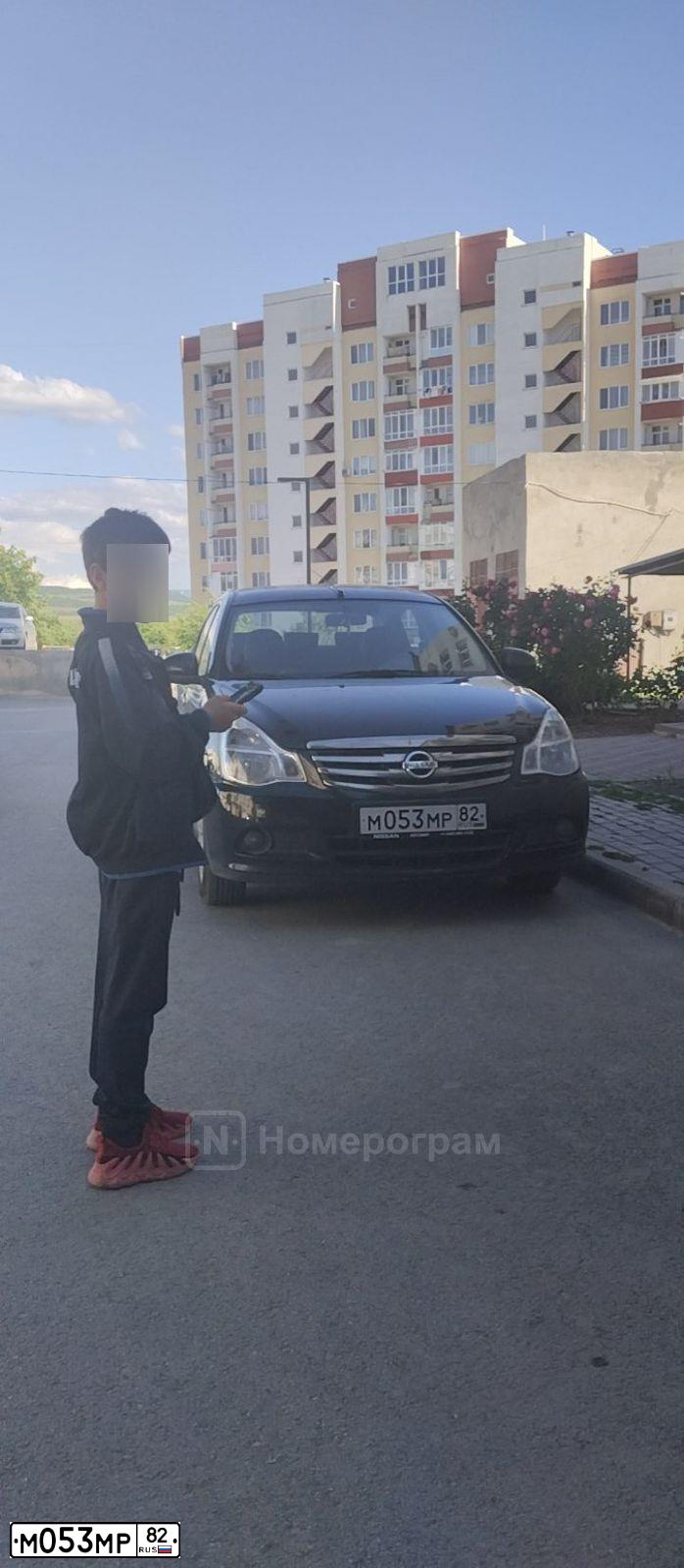 Фото автомобиля NISSAN ALMERA /AVTOVAZ/, 2018 — госномер М053МР82. Цвет: ЧЕРНЫЙ