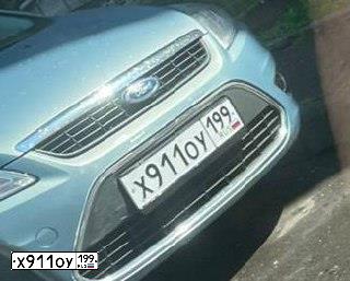 Фото автомобиля PORSCHE CAYENNE, 2009 — госномер Х991ОУ199. Цвет: ЧЕРНЫЙ