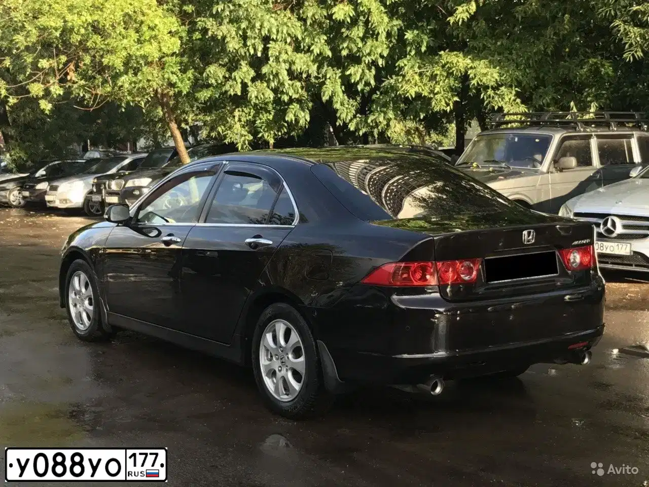Фото автомобиля HYUNDAI /S-/COUPE / TUSCANI, 2005 — госномер М984КТ777. Цвет: ЧЕРНЫЙ