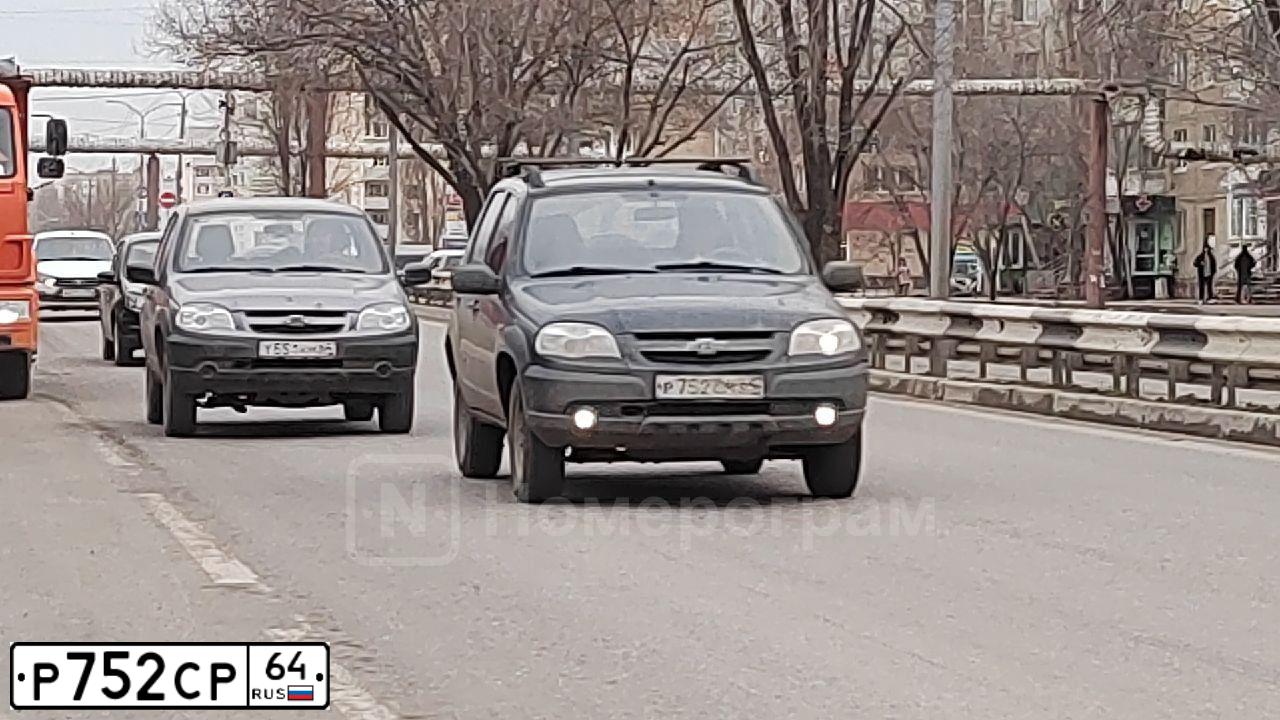 Фото автомобиля LADA 2109 SAMARA, 2005 — госномер М409УУ164. Цвет: Серебристый