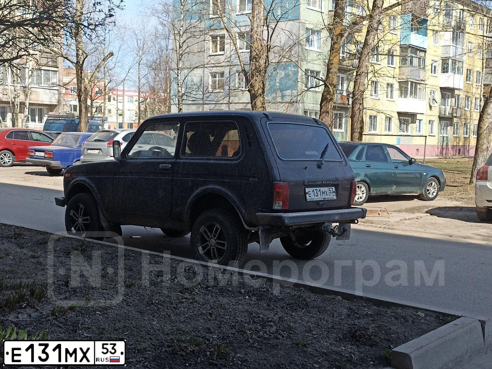 Фото автомобиля LADA 2121 NIVA, 2008 — госномер Е131МХ53. Цвет: ТЕМНО-КОРИЧНЕВЫЙ