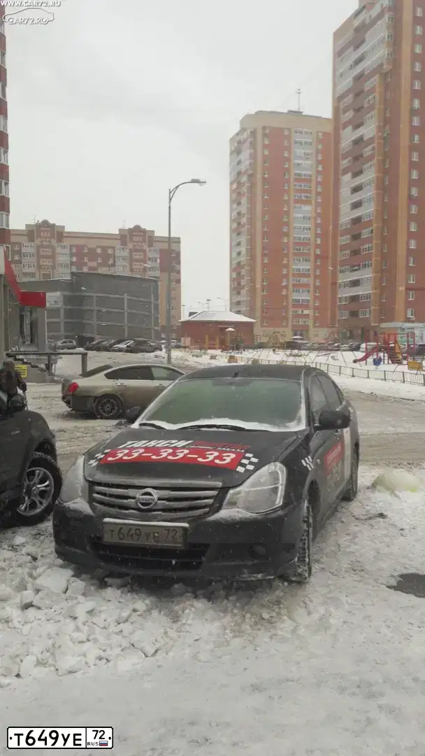 Фото автомобиля NISSAN ALMERA /AVTOVAZ/, 2017 — госномер Т649УЕ72. Цвет: ЧЕРНЫЙ