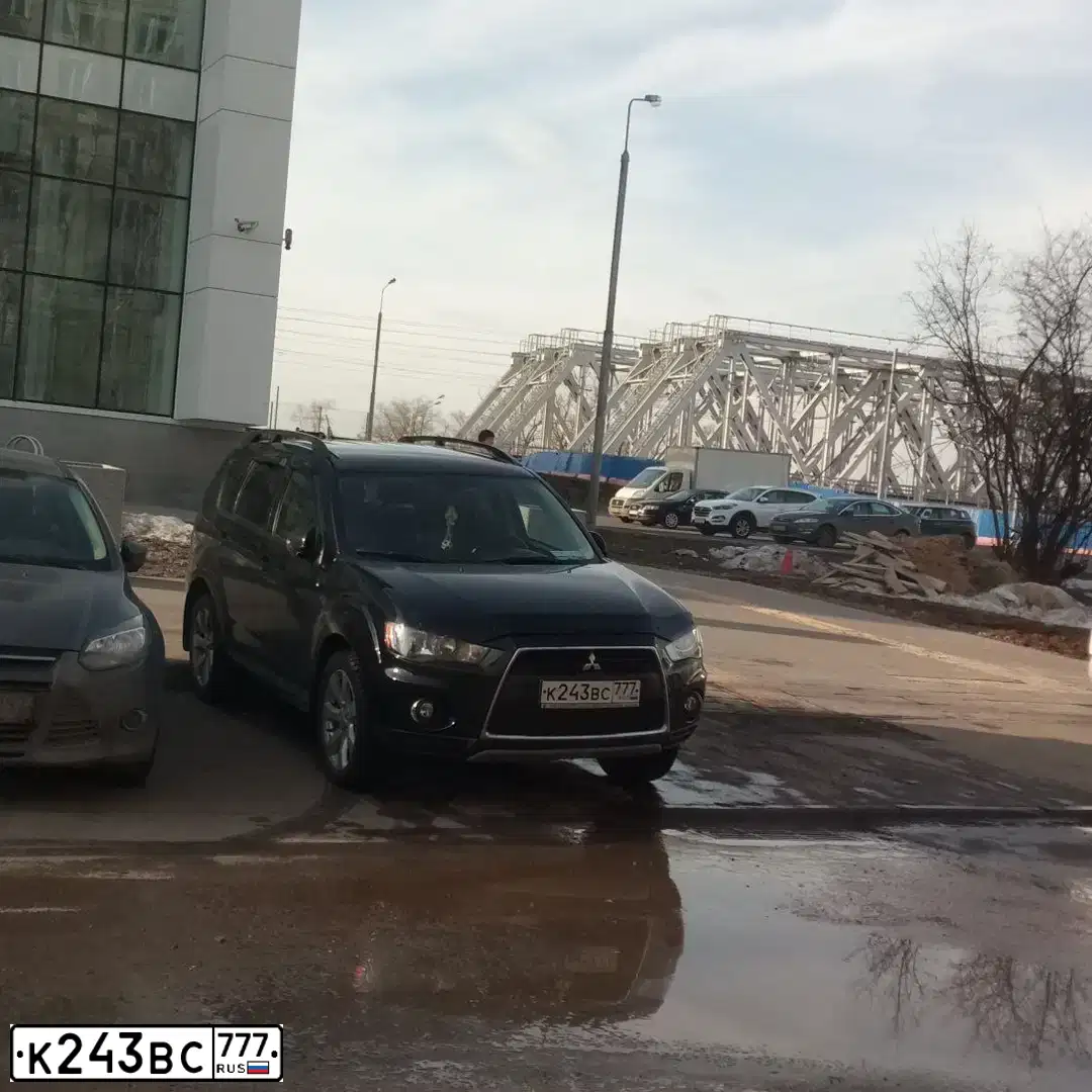 Фото автомобиля MITSUBISHI OUTLANDER, 2011 — госномер С267ОО190. Цвет: ЧЕРНЫЙ