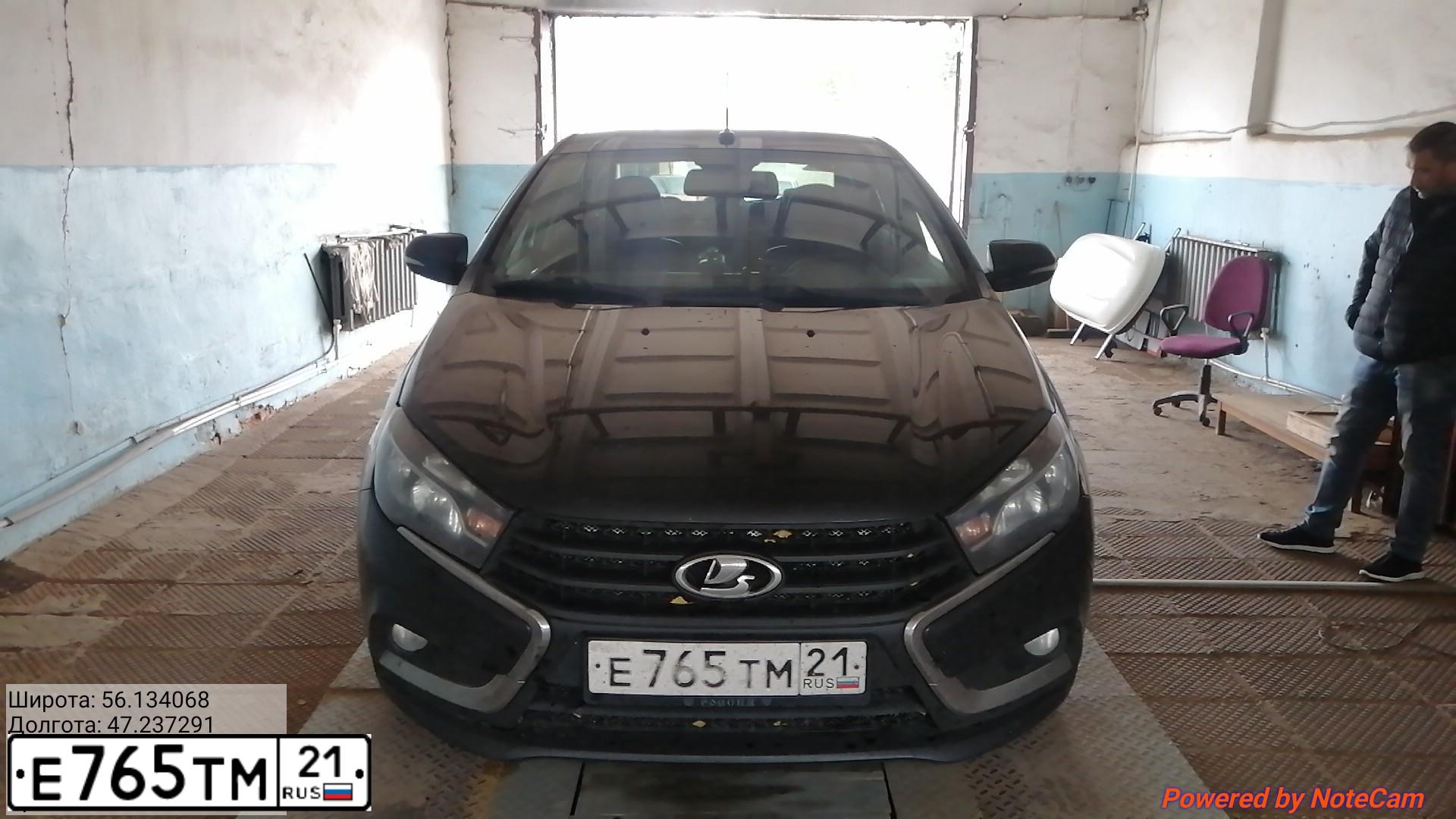 Фото автомобиля LADA VESTA, 2017 — госномер Е765ТМ21. Цвет: ЧЕРНЫЙ