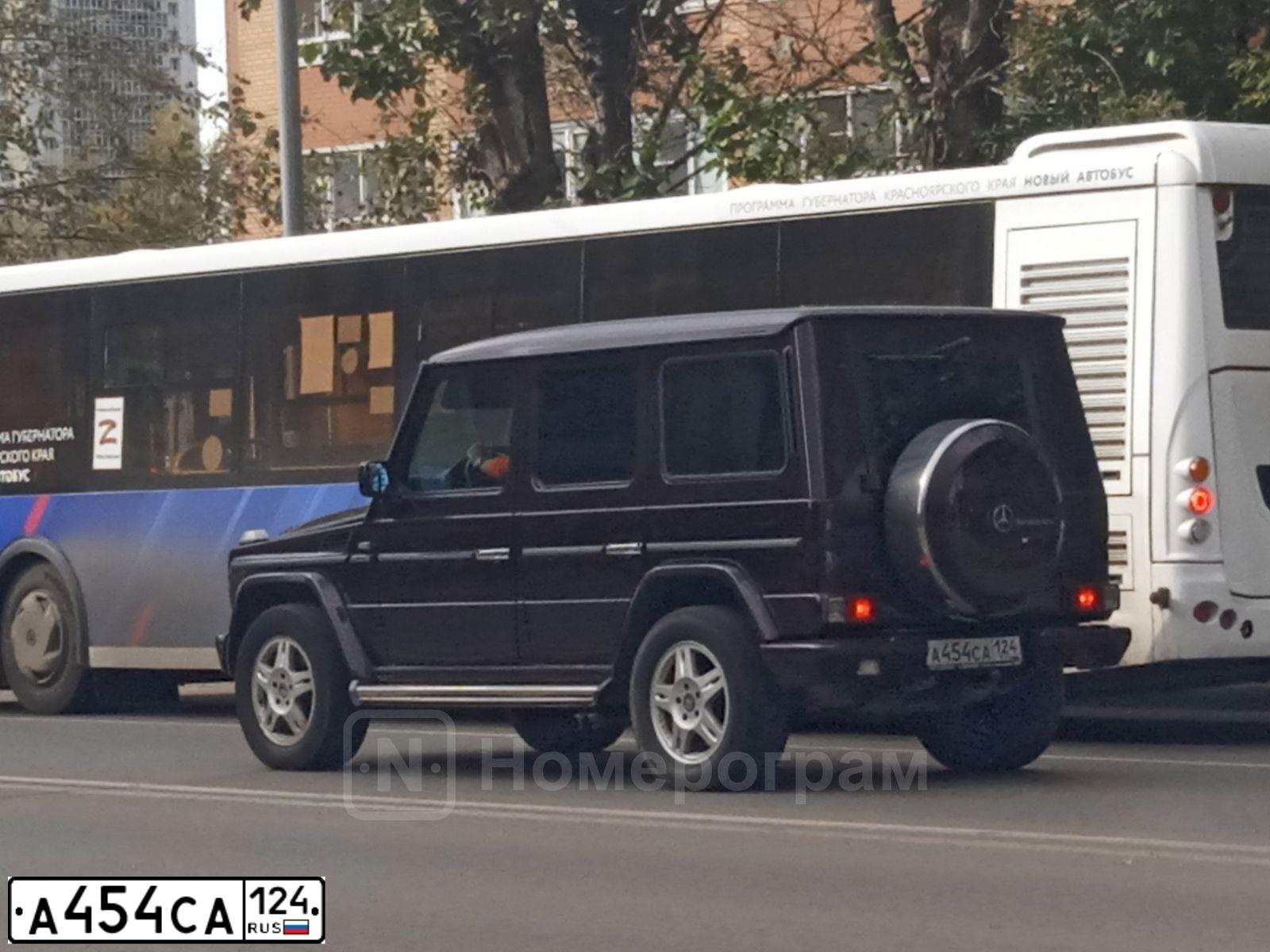 Фото автомобиля MERCEDES G-KLASSE, 1999 — госномер А454СА124. Цвет: ТЕМНО-ФИОЛЕТОВЫЙ
