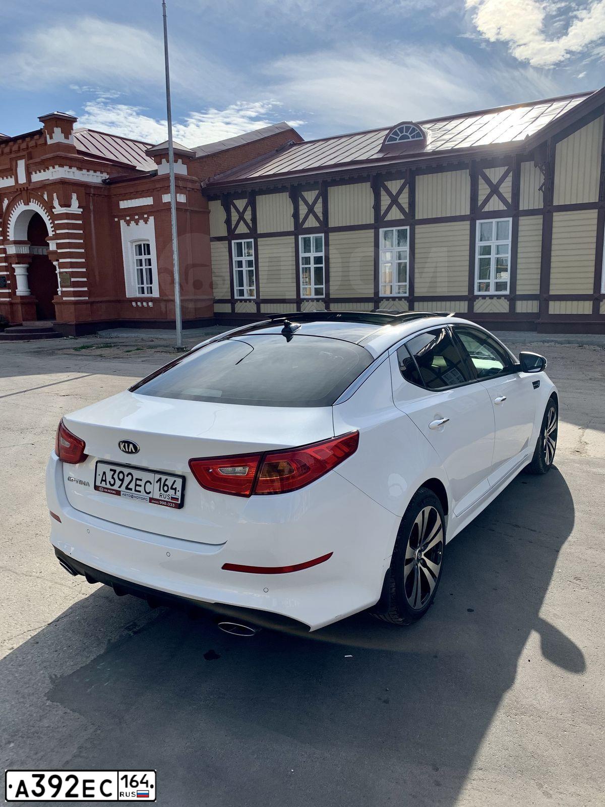 Фото автомобиля KIA OPTIMA, 2013 — госномер М827КО21. Цвет: Белый