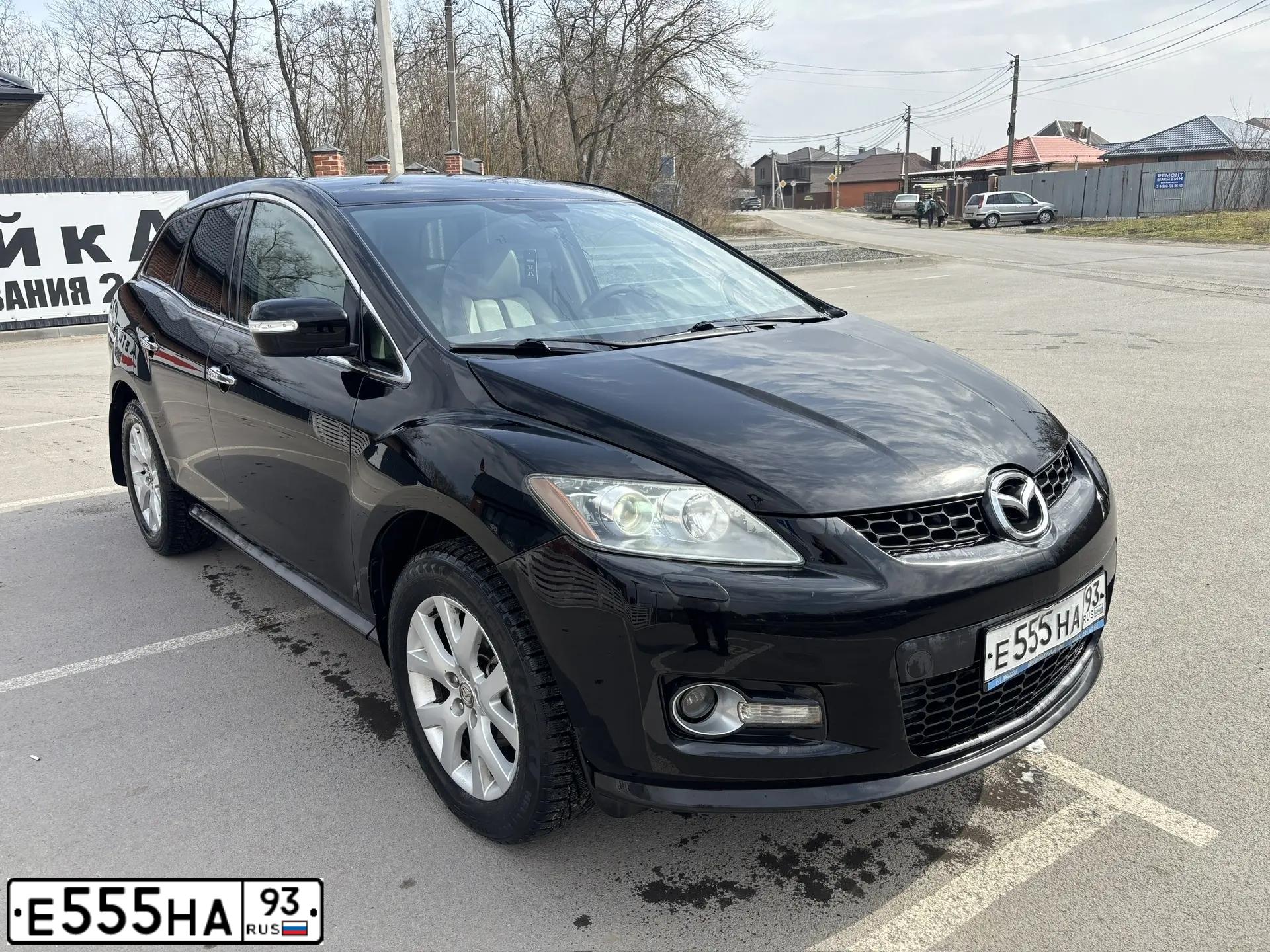 Фото автомобиля MAZDA CX-7, 2008 — госномер Е555НА93. Цвет: ЧЕРНЫЙ