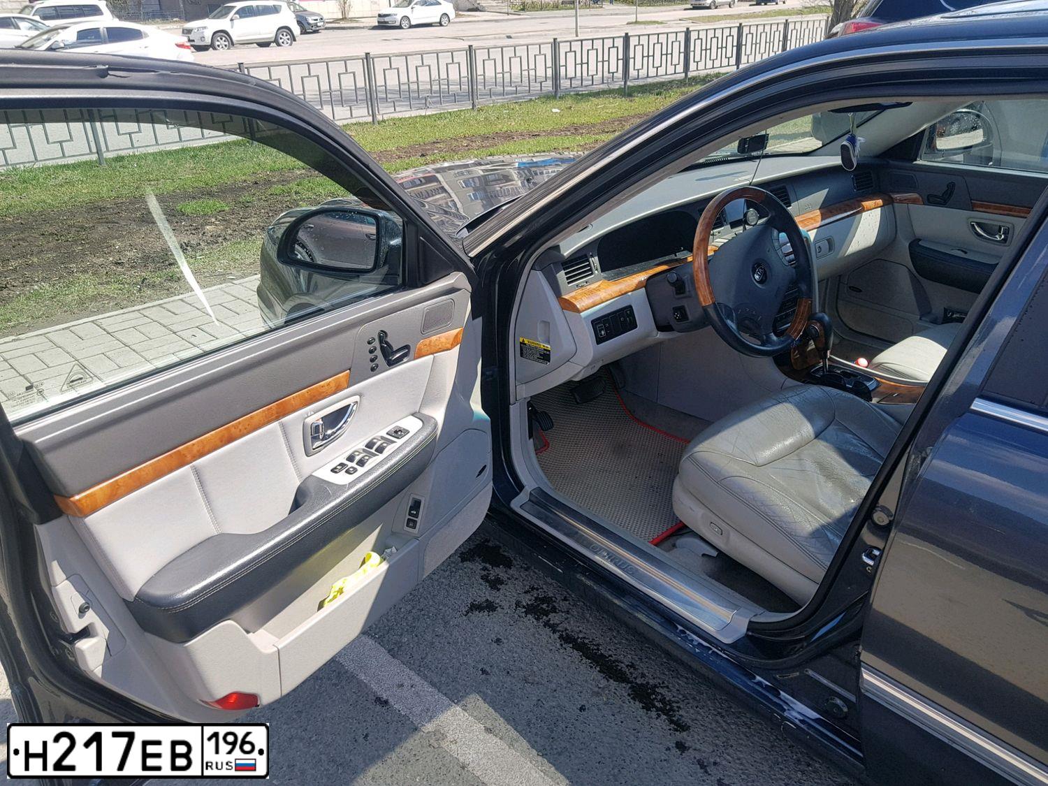Фото автомобиля KIA OPIRUS, 2004 — госномер Р963ЕЕ96. Цвет: СЕРЫЙ